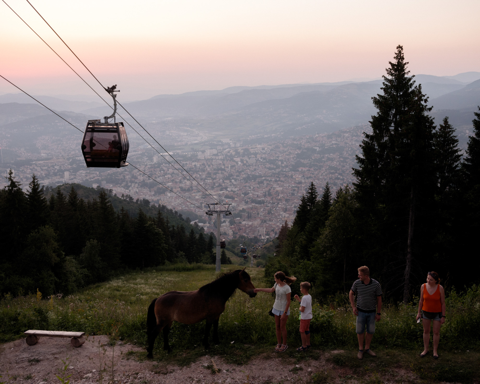 horse and a family above sarajevo